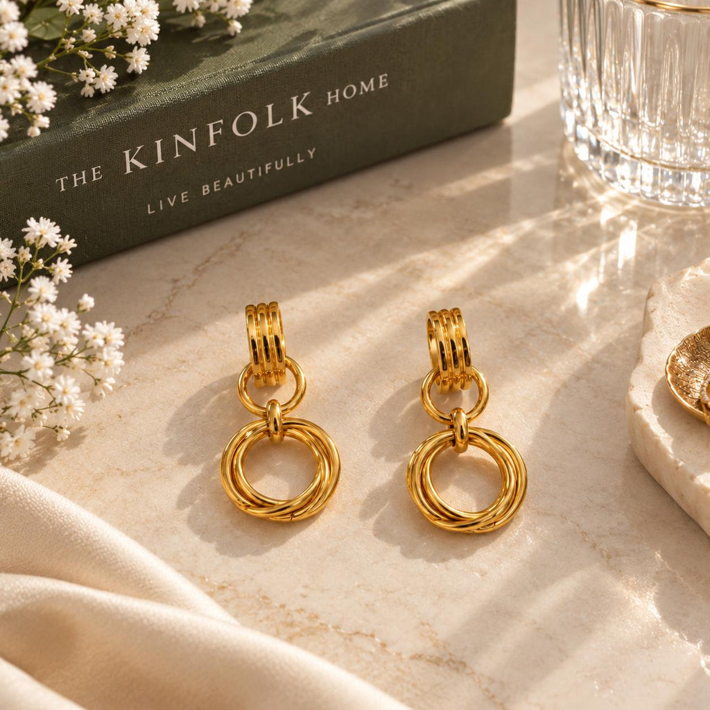 Aretes colgantes dorados para mujer con aros entrelazados, estilo elegante y moderno