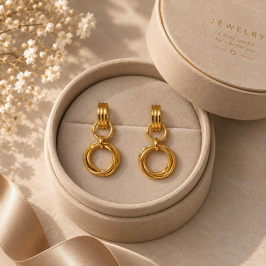 Aretes colgantes dorados para mujer con aros entrelazados, estilo elegante y moderno