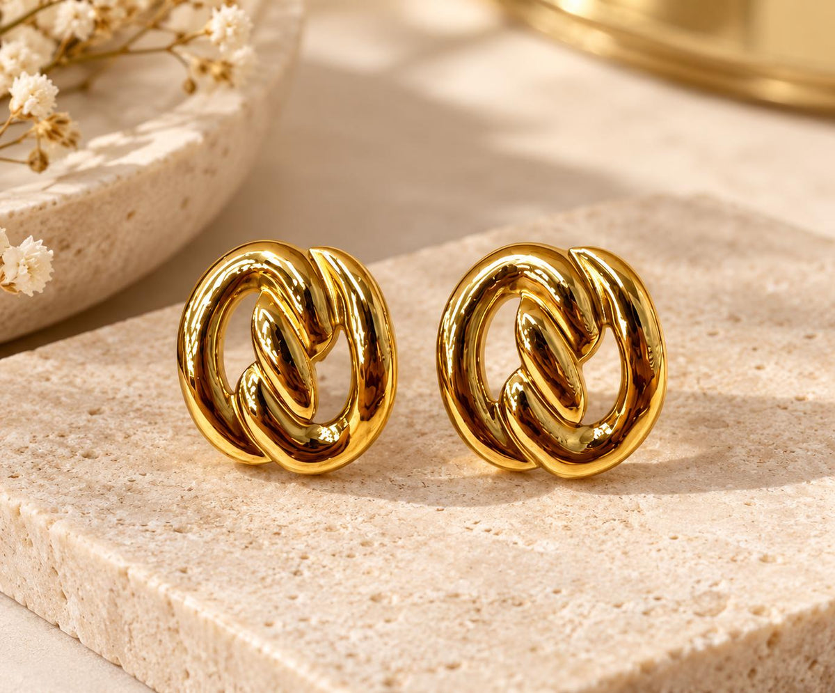 Aretes dorados de eslabones entrelazados para mujer, estilo moderno y elegante