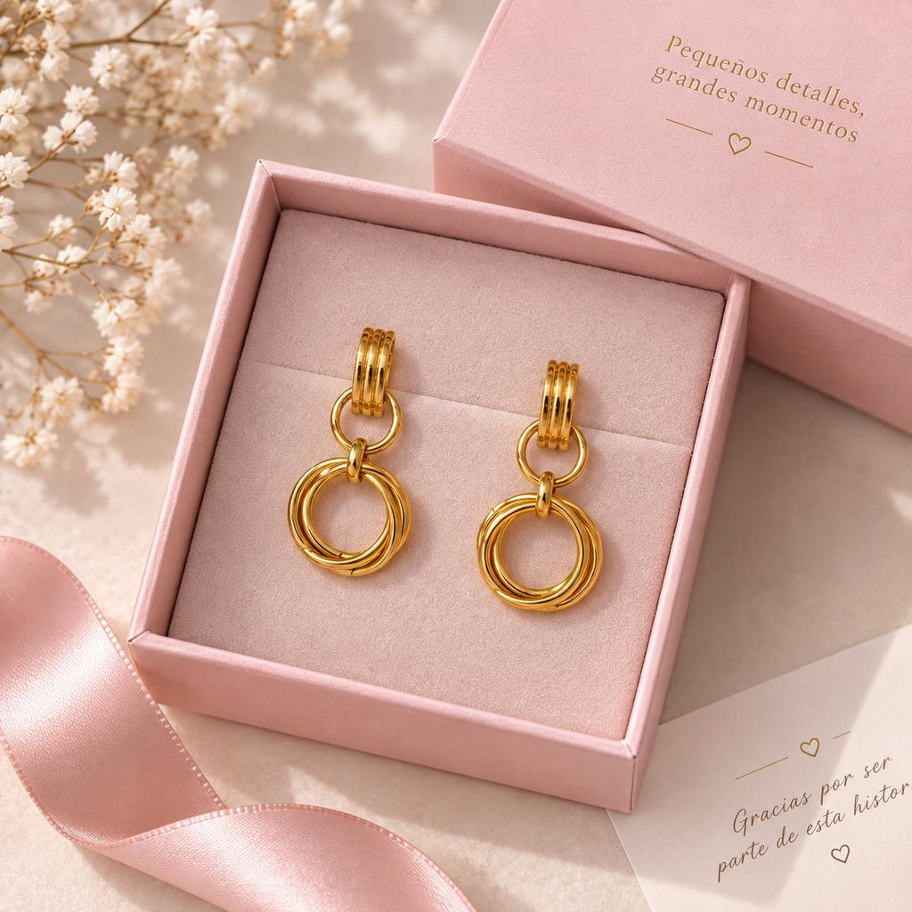 Aretes colgantes dorados para mujer con aros entrelazados, estilo elegante y moderno