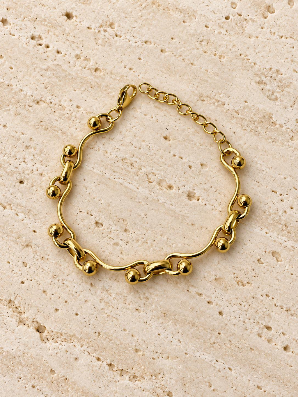 Pulsera Dorada con Diseño de Ondas y Bolitas — Elegante y Minimalista para Mujer