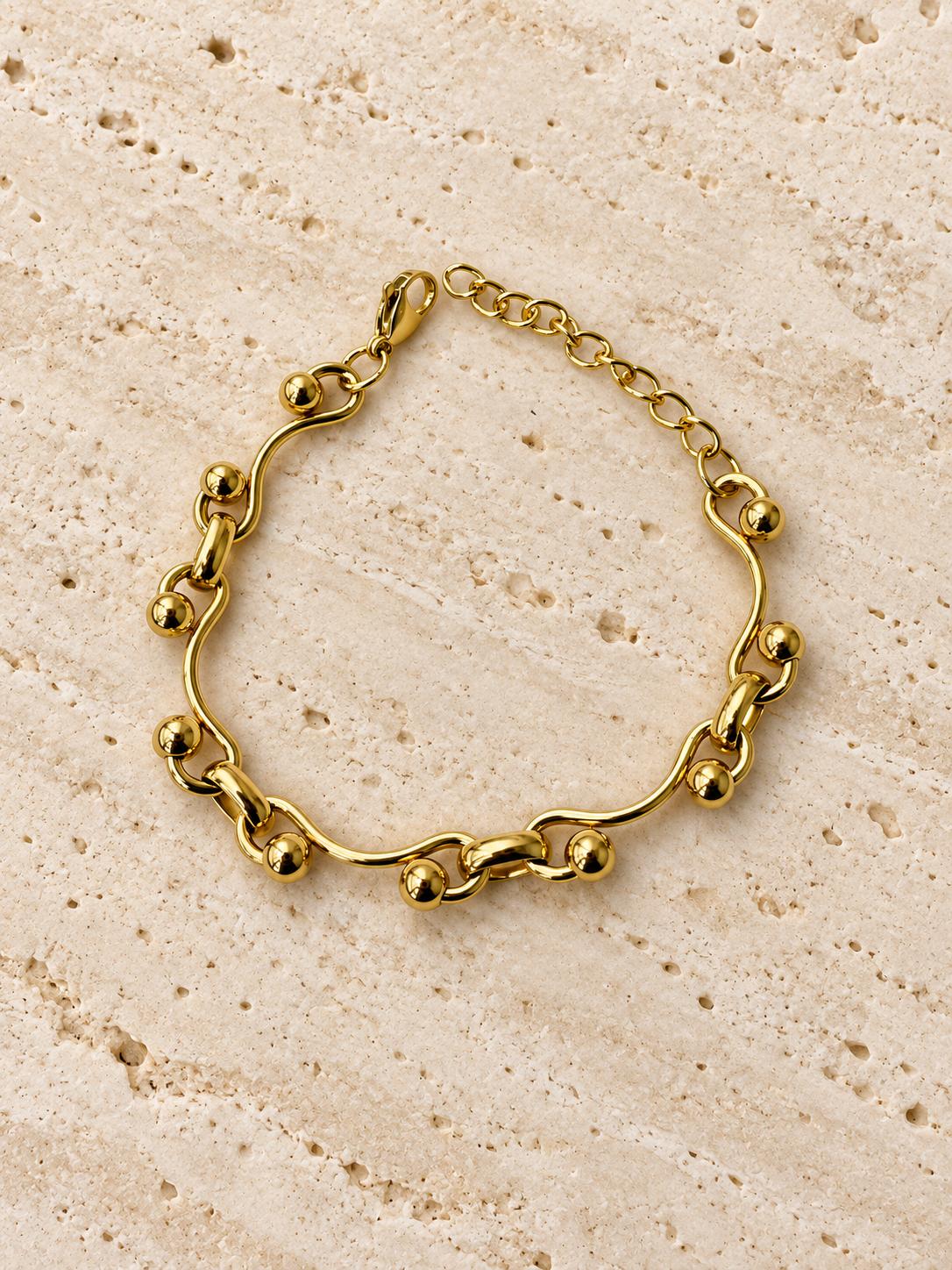 Pulsera Dorada con Diseño de Ondas y Bolitas — Elegante y Minimalista para Mujer