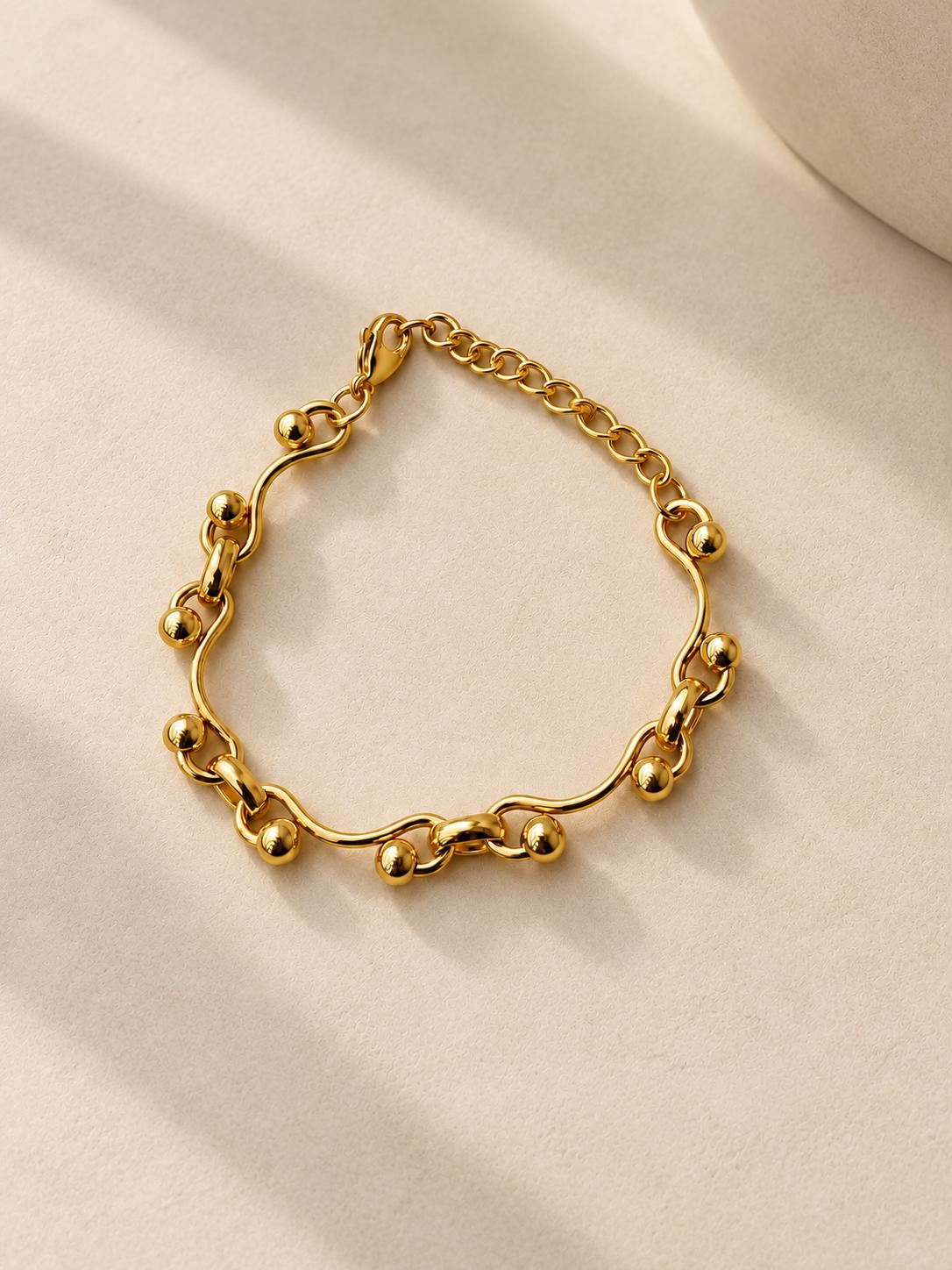 Pulsera Dorada con Diseño de Ondas y Bolitas — Elegante y Minimalista para Mujer