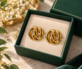 Aretes dorados de eslabones entrelazados para mujer, estilo moderno y elegante